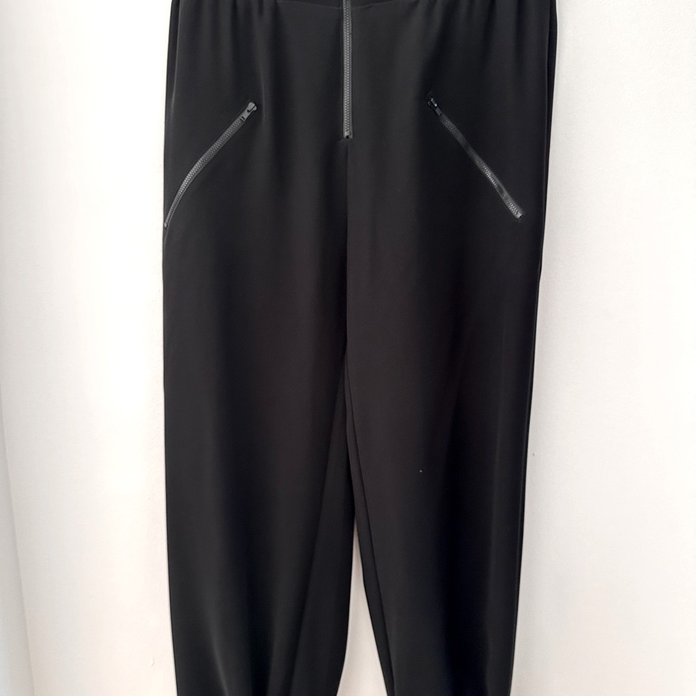 Never worn! Black XL pants with ZIPPERS! Excellent condition. Versatile!